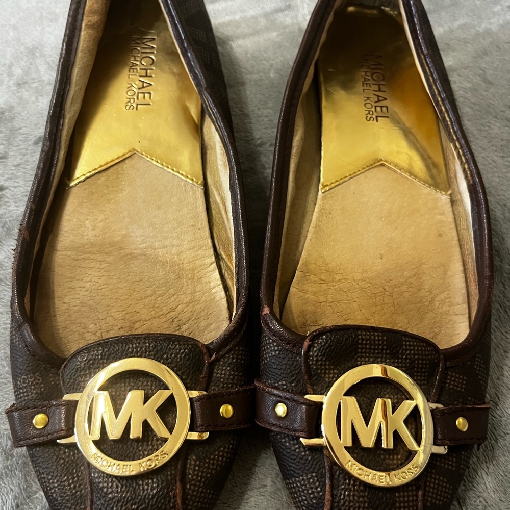 Michael Kors Leather brown flats with gold emblem MK
